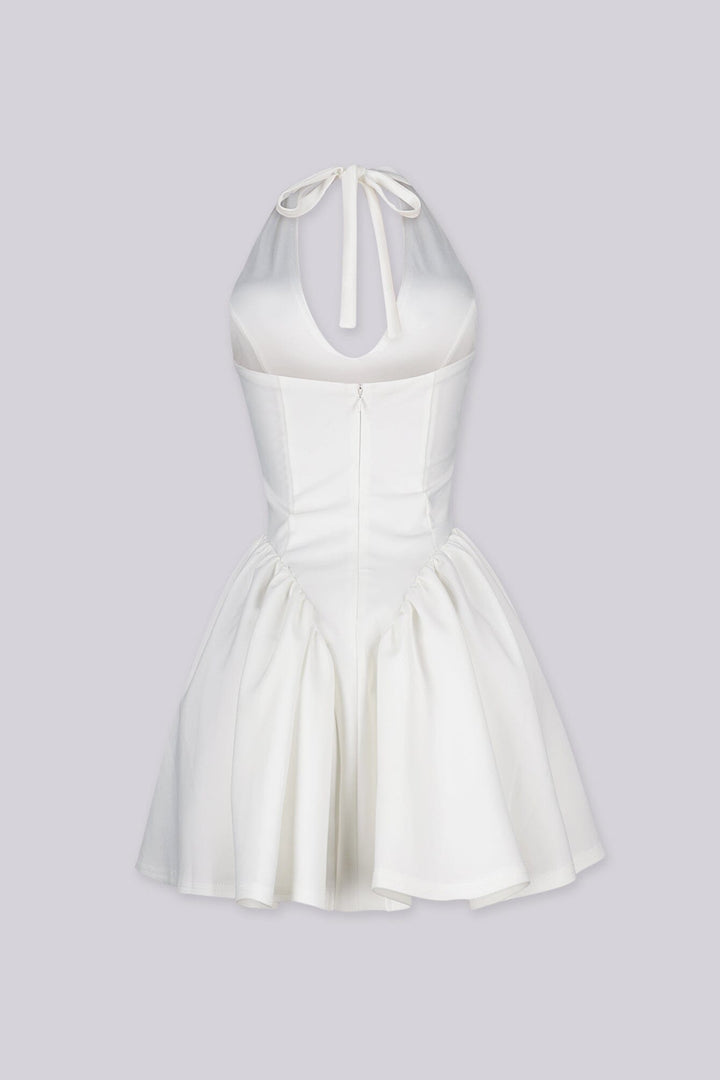 Fitted bodice halter neck mini dress with plunging v neckline featuring drop waist seams for flared swing hem