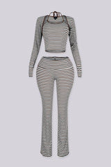 Ribbed knit fine striped halter neck tank top with long sleeves cropped bolero,
Matching flared pants with a fold over ribbed waistband