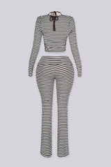Ribbed knit fine striped halter neck tank top with long sleeves cropped bolero,
Matching flared pants with a fold over ribbed waistband