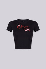 Soft cotton baby tee with a bold “Love The Lovers Play The Players” graphic