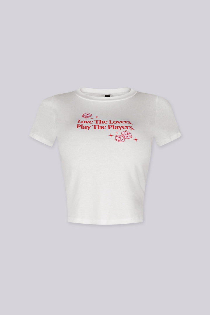 Soft cotton baby tee with a bold “Love The Lovers Play The Players” graphic