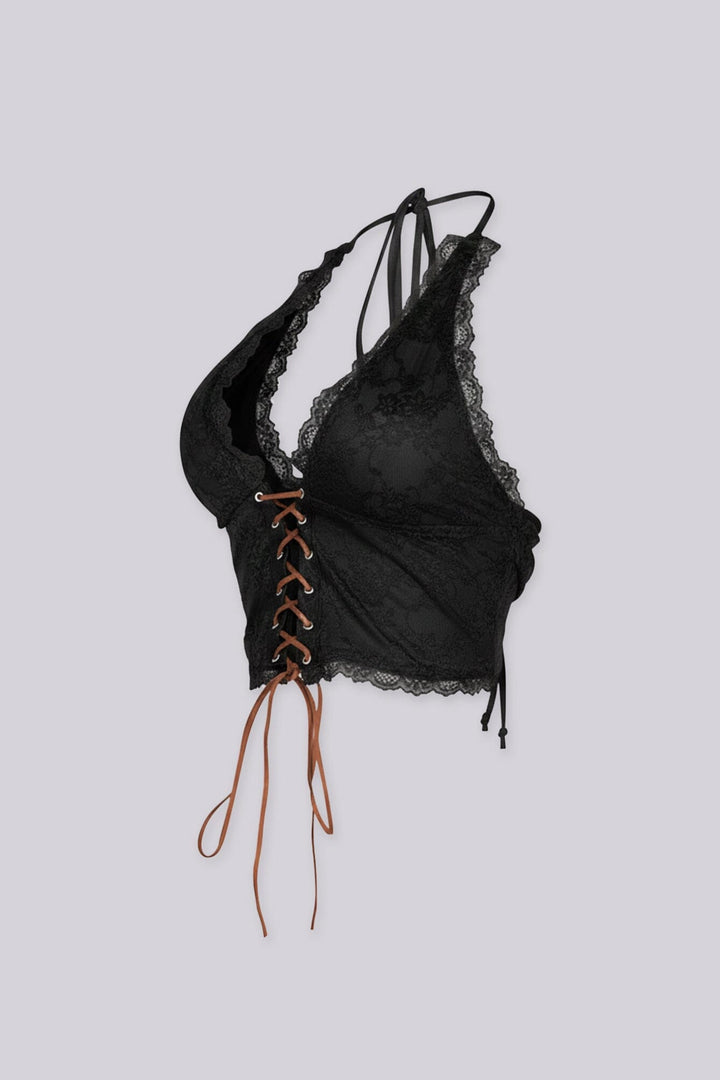 Halter neck suede lace-up top with deep V neckline
Adjustable open back design for a bold and fitted silhouette
