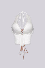 Halter neck suede lace-up top with deep V neckline
Adjustable open back design for a bold and fitted silhouette