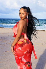Floral print halter maxi dress with 3D tropical applique at the front neck featuring teardrop keyhole cutout detailing