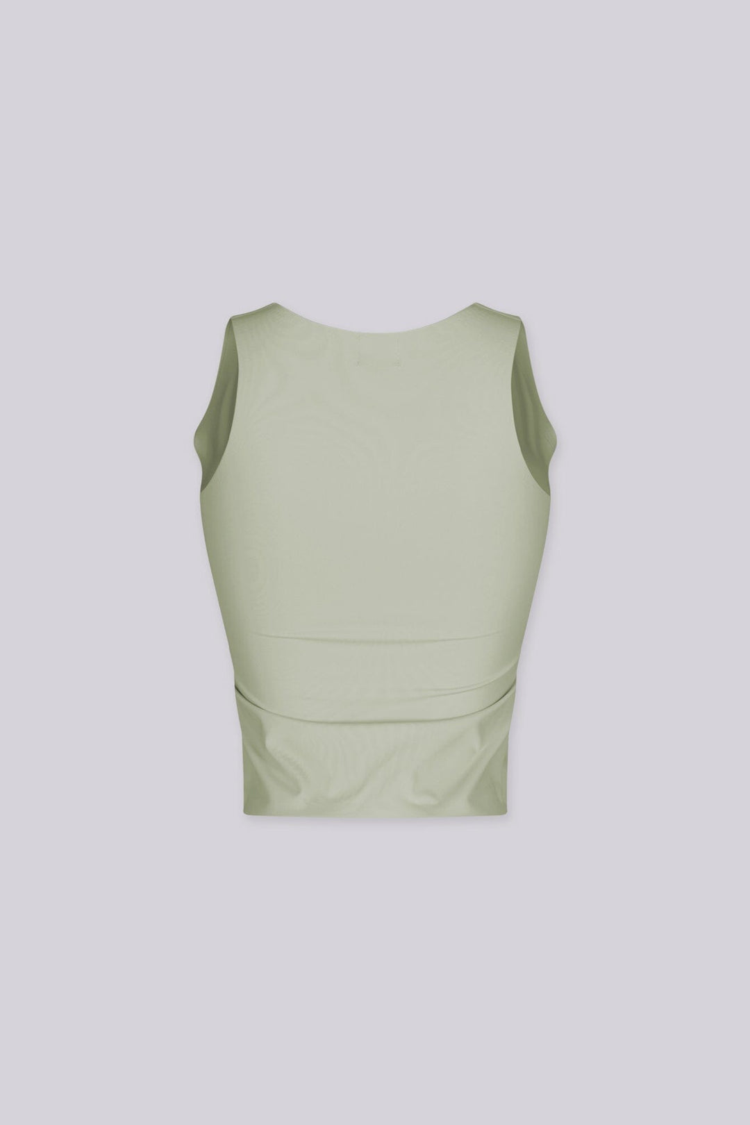 Sleeveless V-neck seamless top
Minimal back design with a softly tailored and contour fit