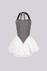 Pinstripe halter neck mini dress with V shaped basque waist featuring pleated ruffled skirt