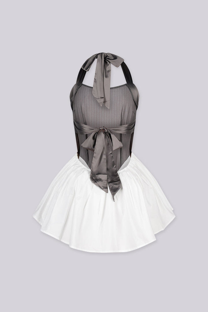 Pinstripe halter neck mini dress with V shaped basque waist featuring pleated ruffled skirt