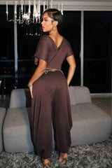 Relaxed fit jersey jumpsuit with deep V neckline and short dolman sleeves