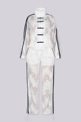 Sheer floral lace jacket with mandarin collar featuring full zip closure and frog knot button detailing at center front