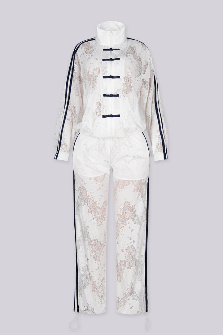 Sheer floral lace jacket with mandarin collar featuring full zip closure and frog knot button detailing at center front