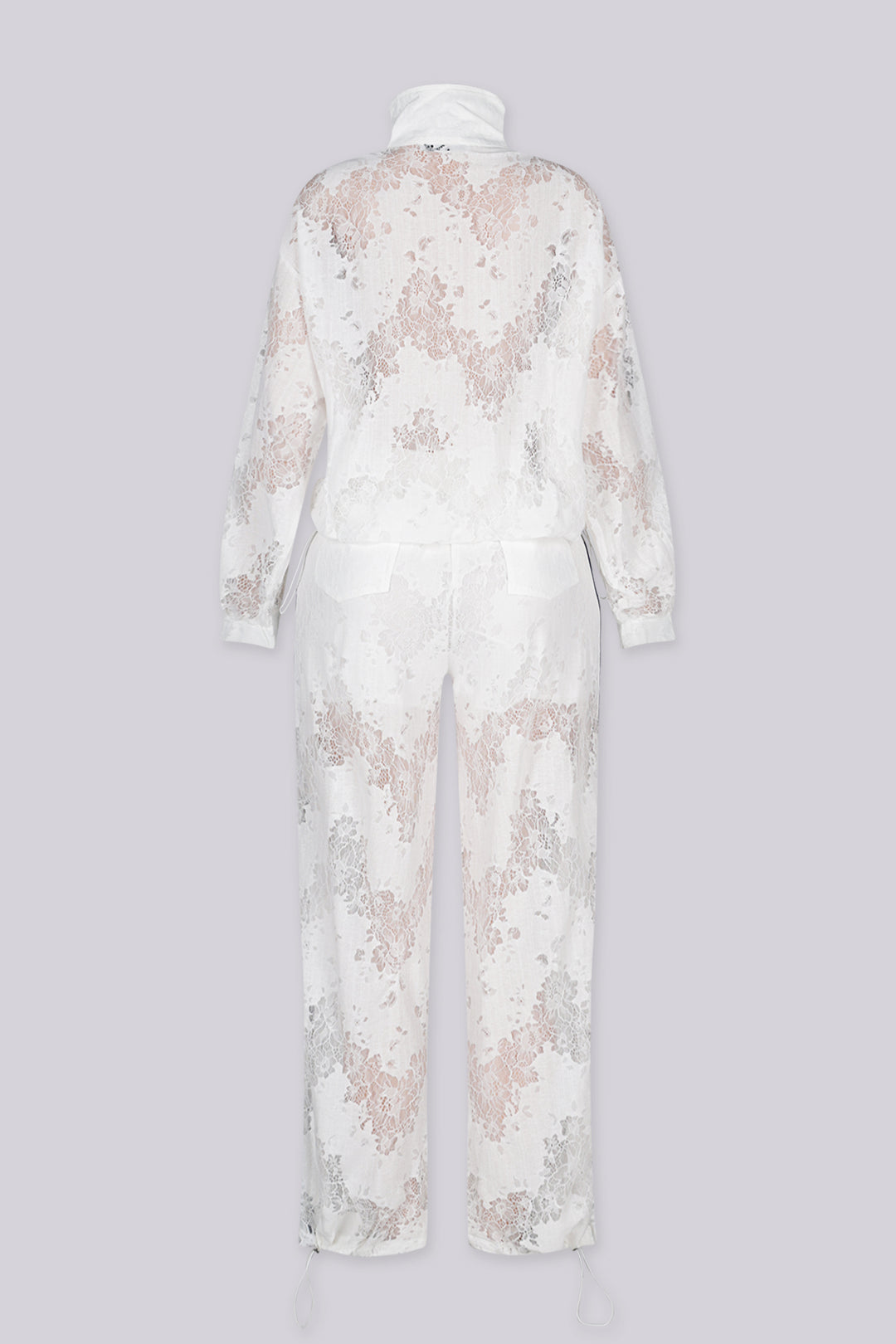 Sheer floral lace jacket with mandarin collar featuring full zip closure and frog knot button detailing at center front