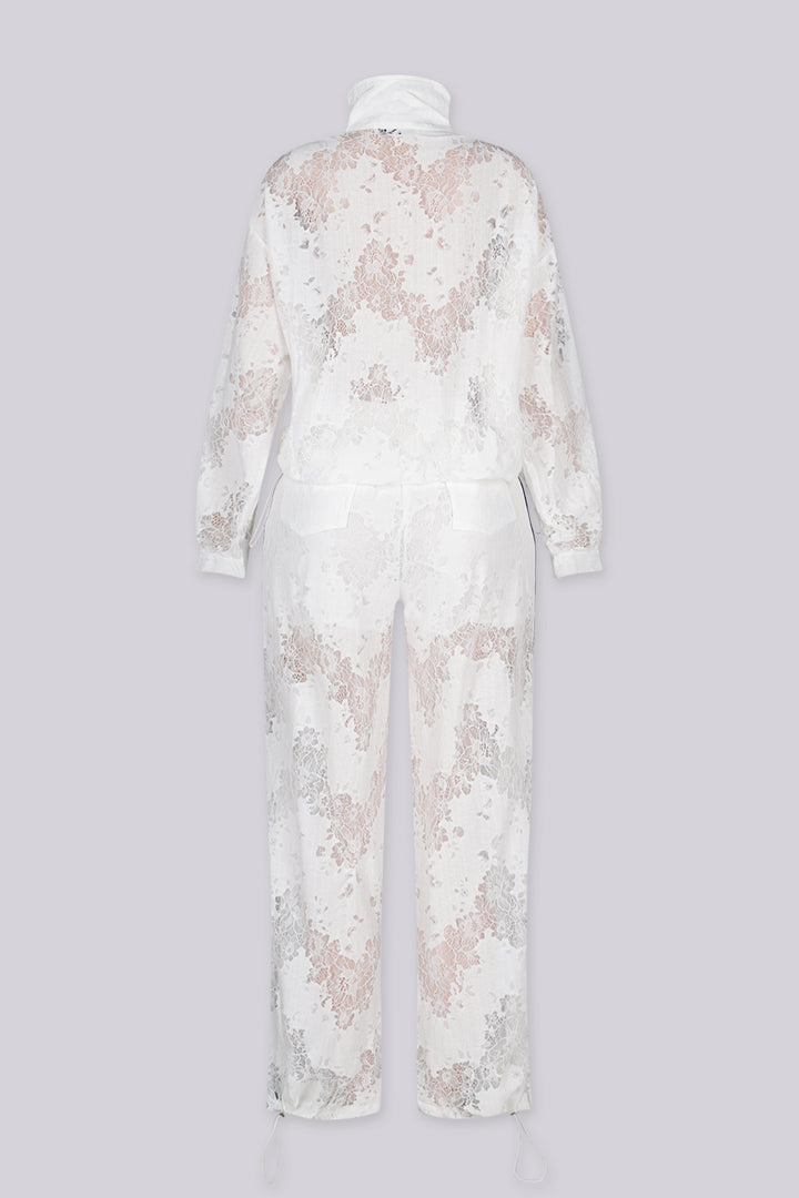 Sheer floral lace jacket with mandarin collar featuring full zip closure and frog knot button detailing at center front