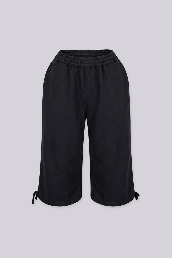 High waisted wide leg fleece capri pants featuring cinched hem with adjustable ties