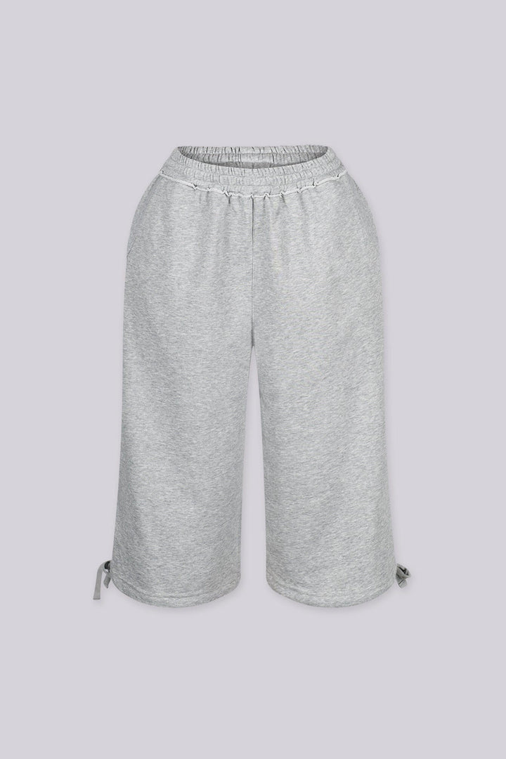 High waisted wide leg fleece capri pants featuring cinched hem with adjustable ties