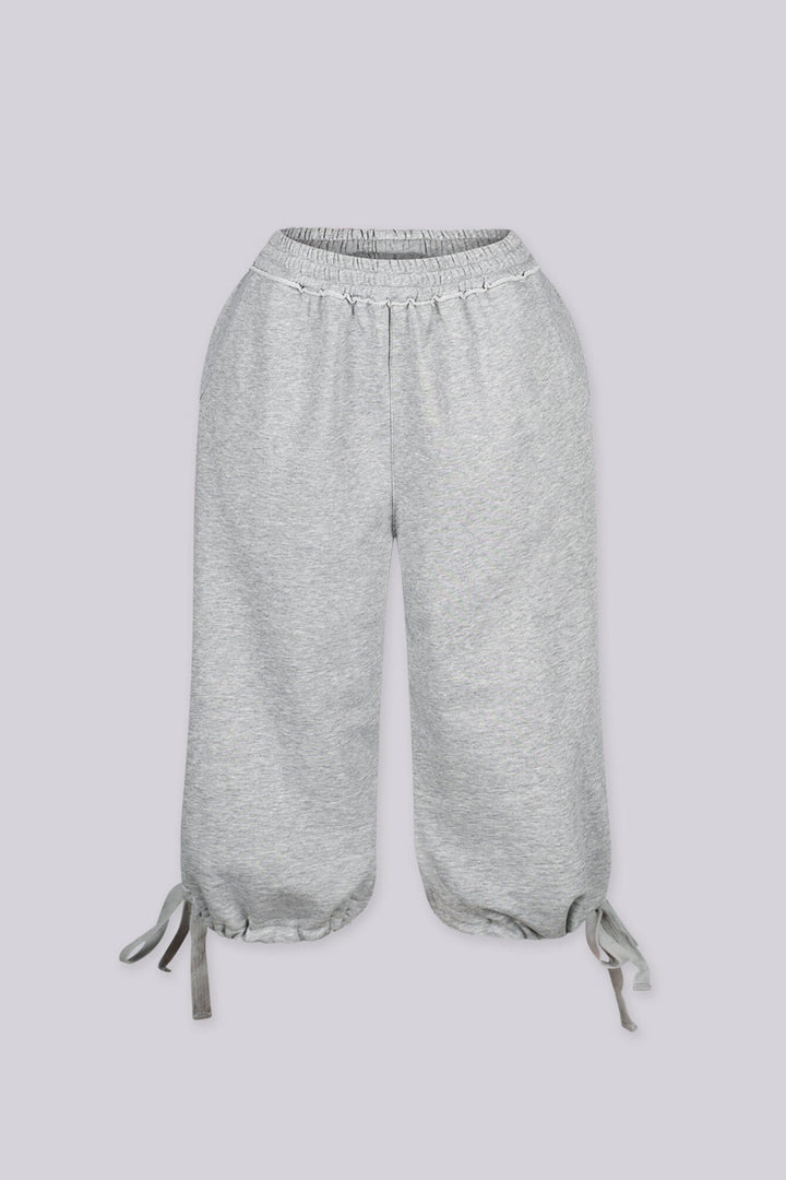 High waisted wide leg fleece capri pants featuring cinched hem with adjustable ties