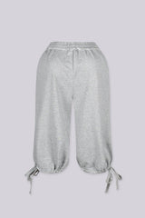 High waisted wide leg fleece capri pants featuring cinched hem with adjustable ties