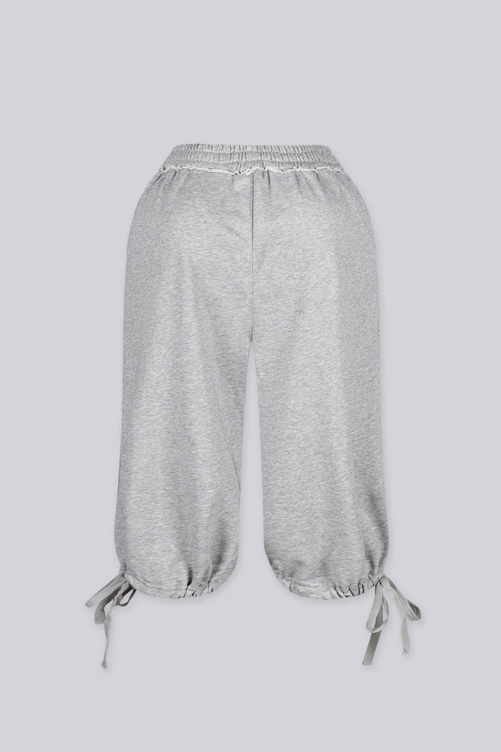 High waisted wide leg fleece capri pants featuring cinched hem with adjustable ties