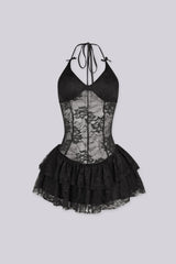 Fitted halter neck line mini dress with tie neck straps and velvet bow accents