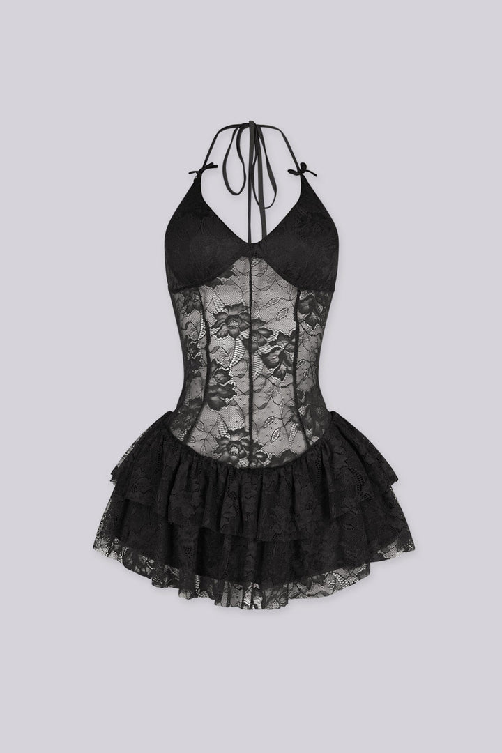Fitted halter neck line mini dress with tie neck straps and velvet bow accents