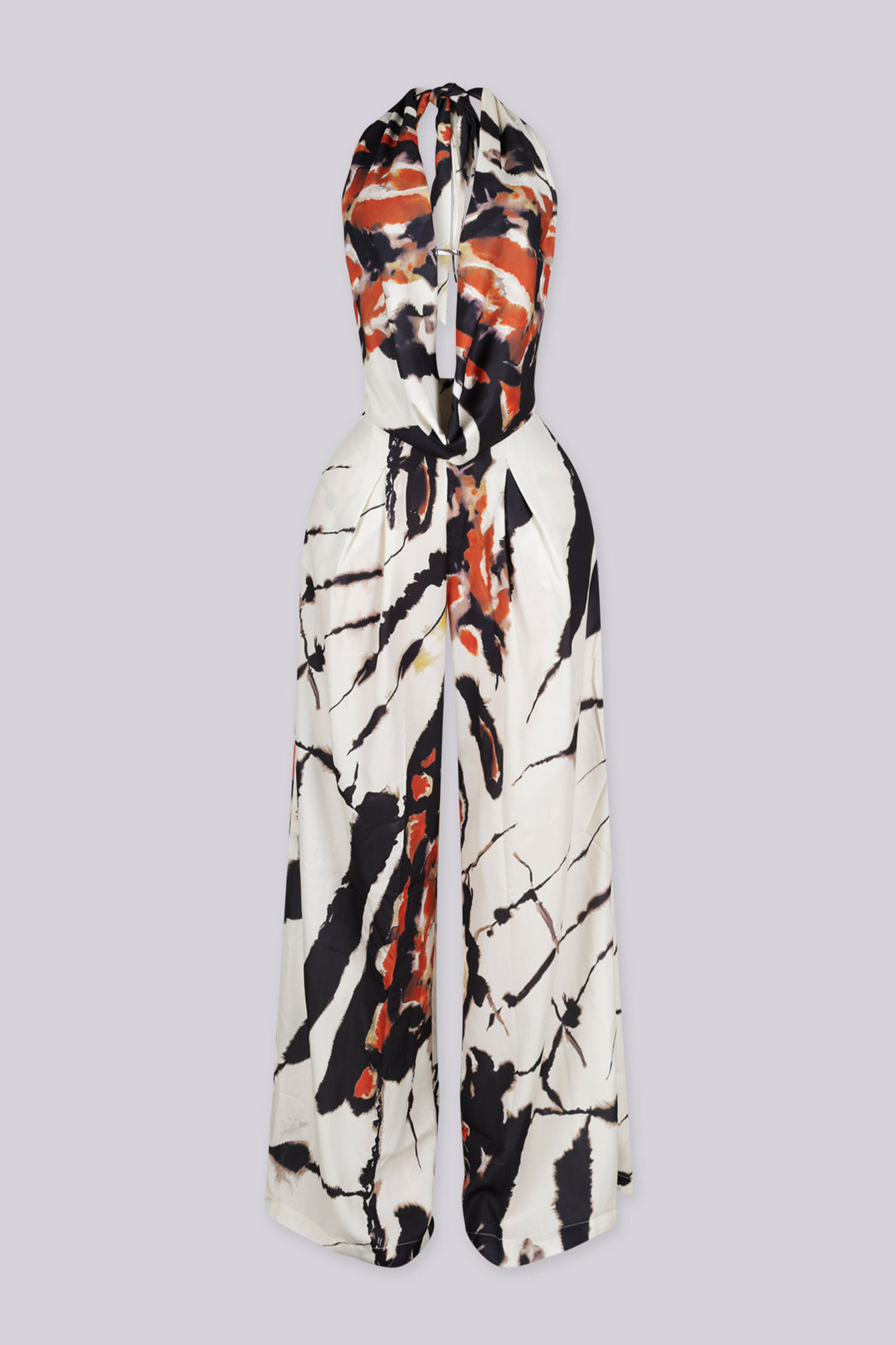 Marble printed halter neckline crop top with a deep V plunging cut to the waist
Adjustable tie back closure