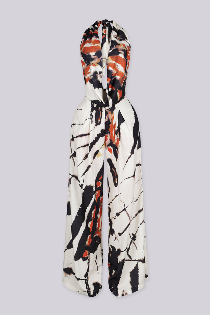 Marble printed halter neckline crop top with a deep V plunging cut to the waist
Adjustable tie back closure