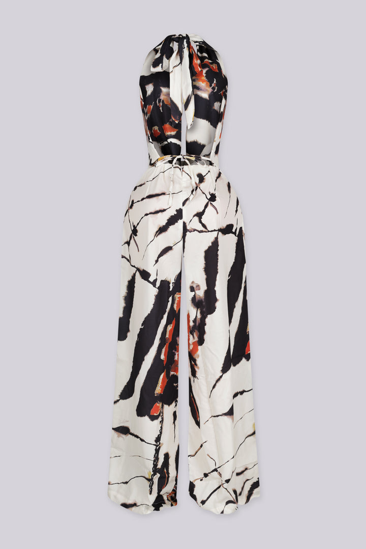 Marble printed halter neckline crop top with a deep V plunging cut to the waist
Adjustable tie back closure