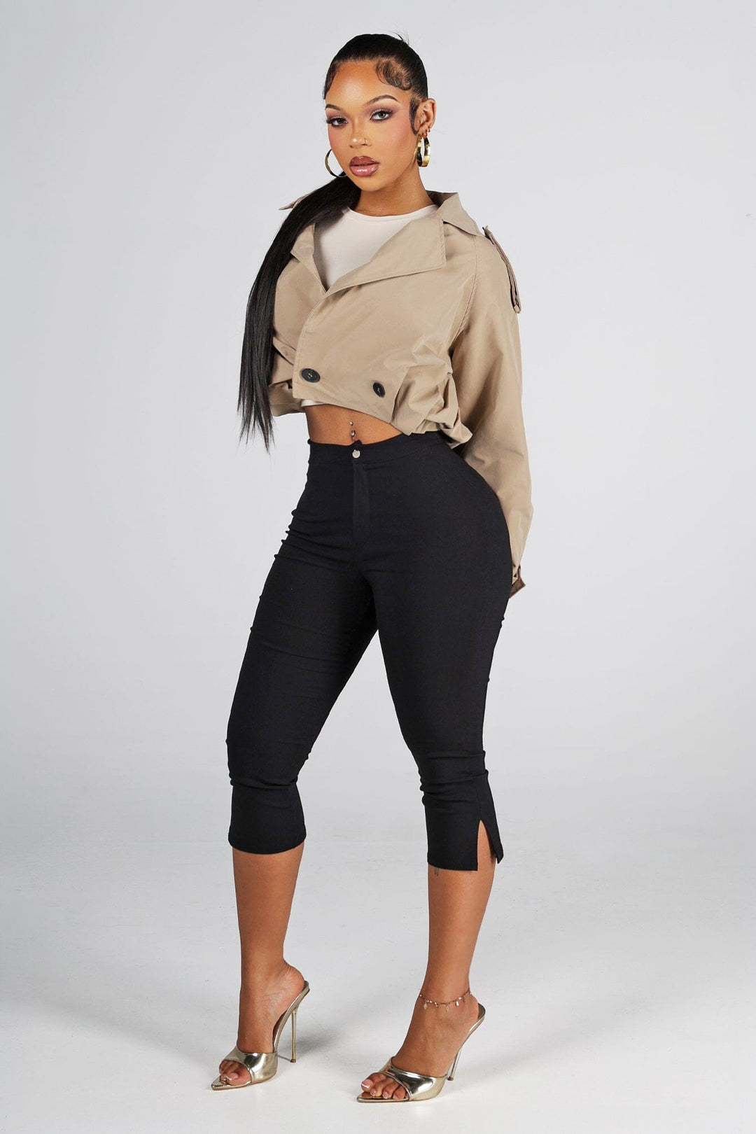 Cropped trench style jacket with an exaggerated fold over collar