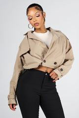 Cropped trench style jacket with an exaggerated fold over collar