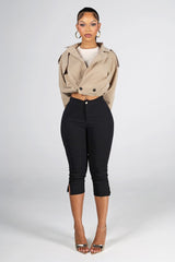 Cropped trench style jacket with an exaggerated fold over collar