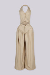 Halter crop top featuring a plunging neckline with&amp;nbsp;a peekaboo waist cutout, front view.