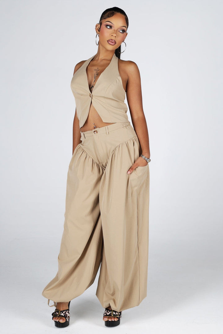 Halter crop top featuring a plunging neckline with&amp;nbsp;a peekaboo waist cutout