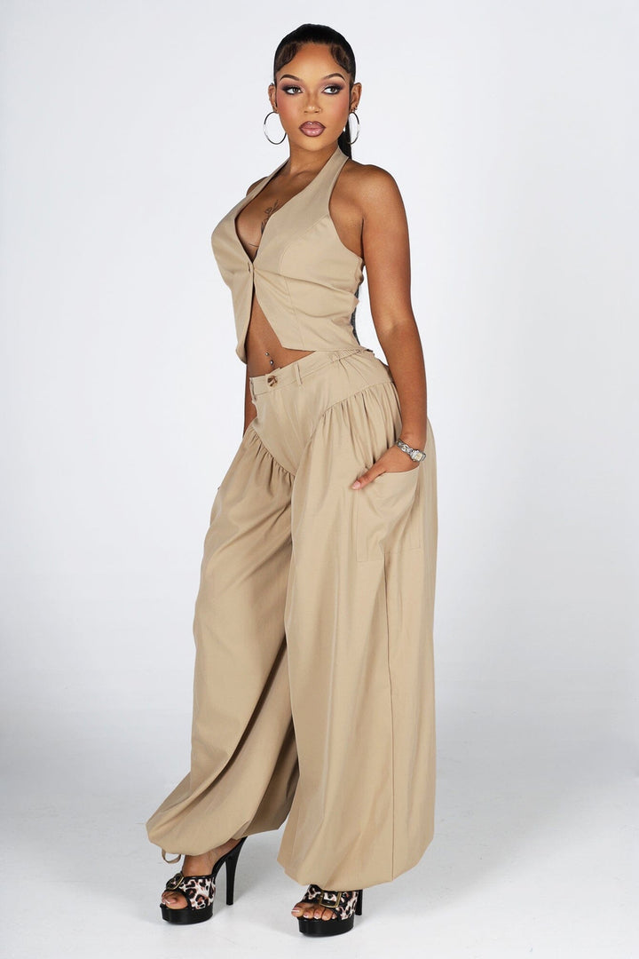 Halter crop top featuring a plunging neckline with&amp;nbsp;a peekaboo waist cutout