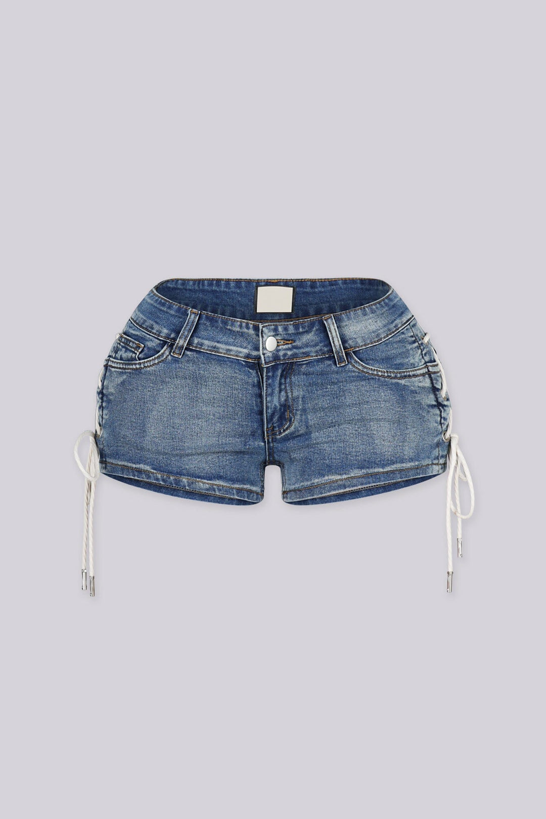 Low rise denim shorts with crisscross rope lacing through metal eyelets detailing