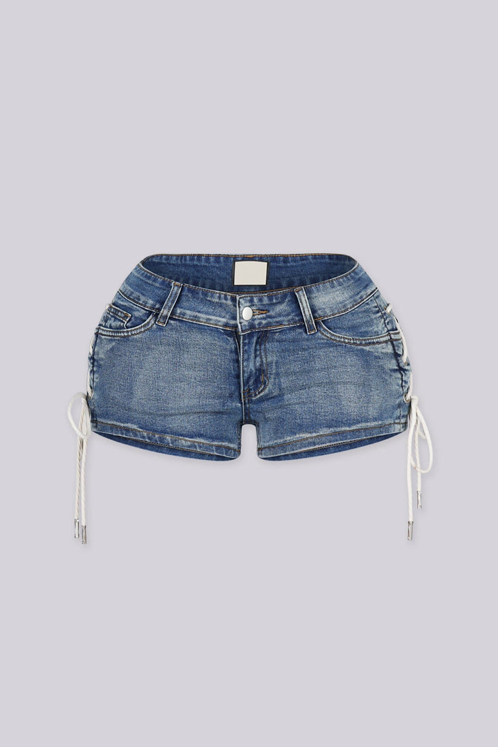 Low rise denim shorts with crisscross rope lacing through metal eyelets detailing