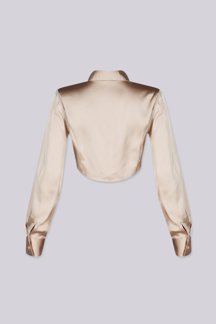 Long sleeve satin blouse featuring a collared neckline and mid rise cropped fit