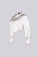 Long sleeve satin blouse featuring a collared neckline and mid rise cropped fit