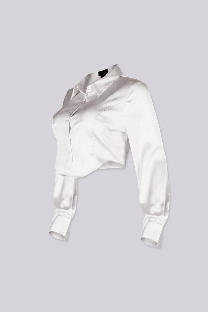 Long sleeve satin blouse featuring a collared neckline and mid rise cropped fit