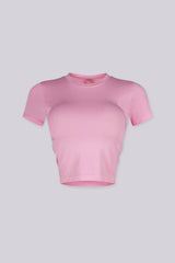 EDGEBYKS - Crew neckline seamless short sleeve crop top t shirt with ribbed hem and cuffs, pink front view