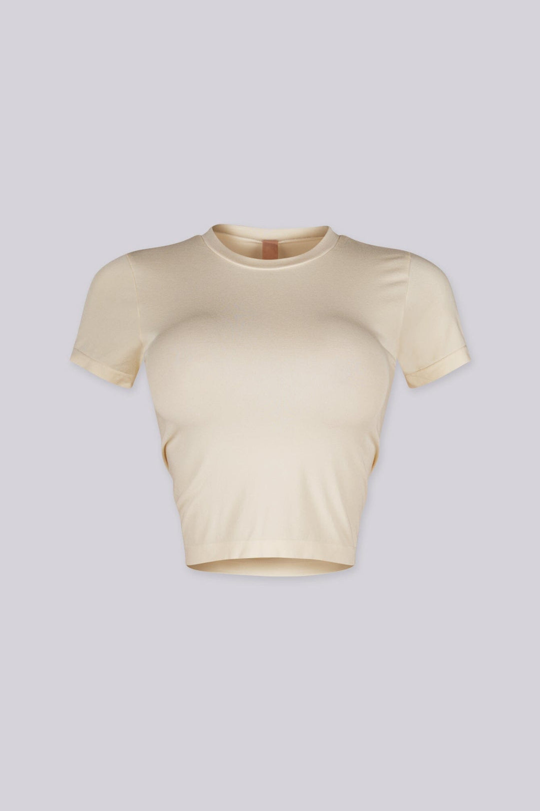 EDGEBYKS - Crew neckline seamless short sleeve crop top t shirt with ribbed hem and cuffs, vanilla front view