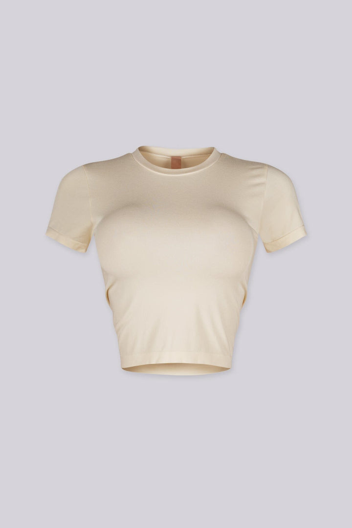 EDGEBYKS - Crew neckline seamless short sleeve crop top t shirt with ribbed hem and cuffs, vanilla front view