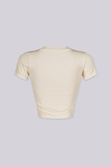 EDGEBYKS - Crew neckline seamless short sleeve crop top t shirt with ribbed hem and cuffs, vanilla back view