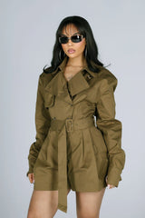 Twill belted trench romper with a classic double breasted front
Adjustable waist belt to define and flatter the silhouette
Shoulder pads included