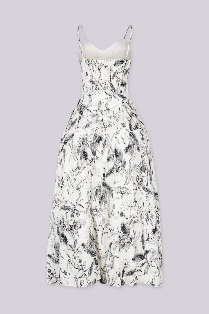 Floral print midi dress with plunging V neckline and thin straps featuring smocked back for stretch fit