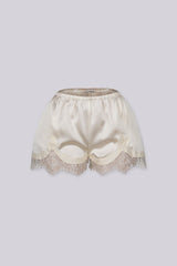 Silky elastic-waist shorts with a soft draped finish
Delicate lace trim hem adds a subtle feminine edge