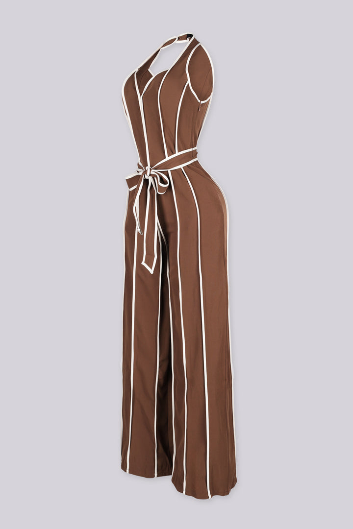 Wide leg halter jumpsuit with a plunging V neckline featuring waist tie