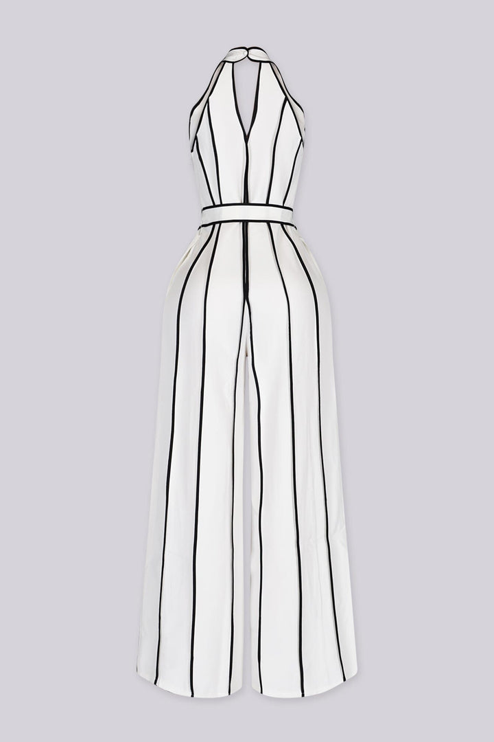 Wide leg halter jumpsuit with a plunging V neckline featuring waist tie