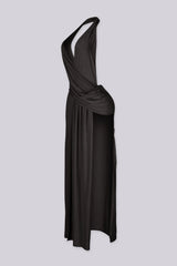 Plunging V cowl neck halter maxi dress with surplice wrap drape across the chest
Open back design with high side slit