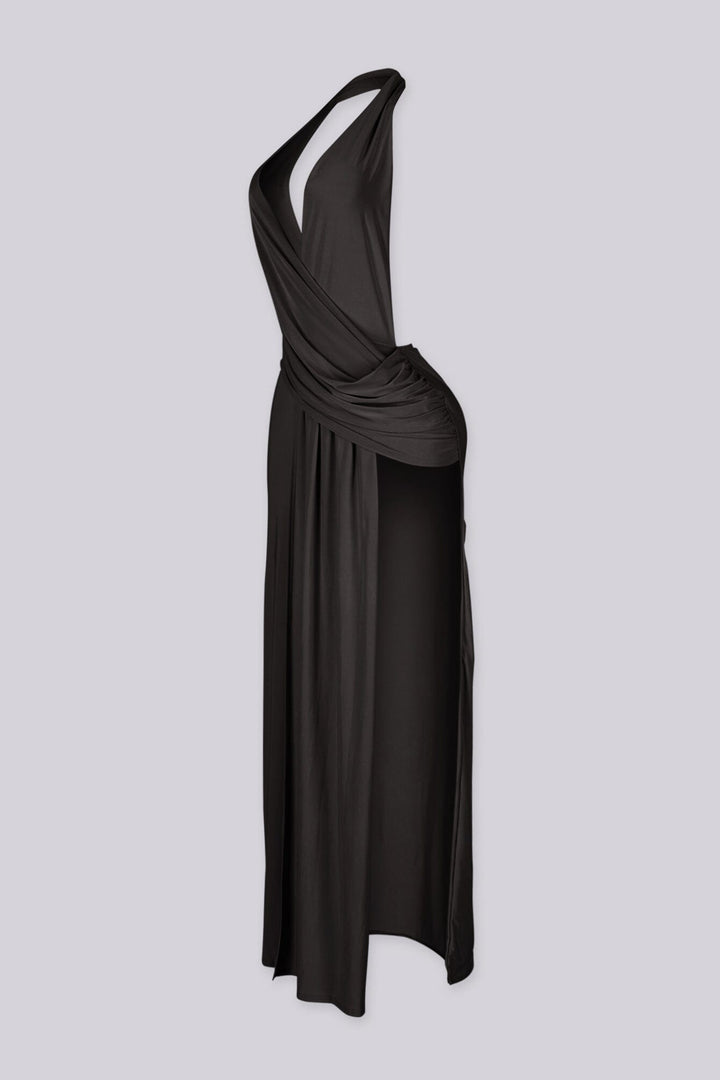 Plunging V cowl neck halter maxi dress with surplice wrap drape across the chest
Open back design with high side slit