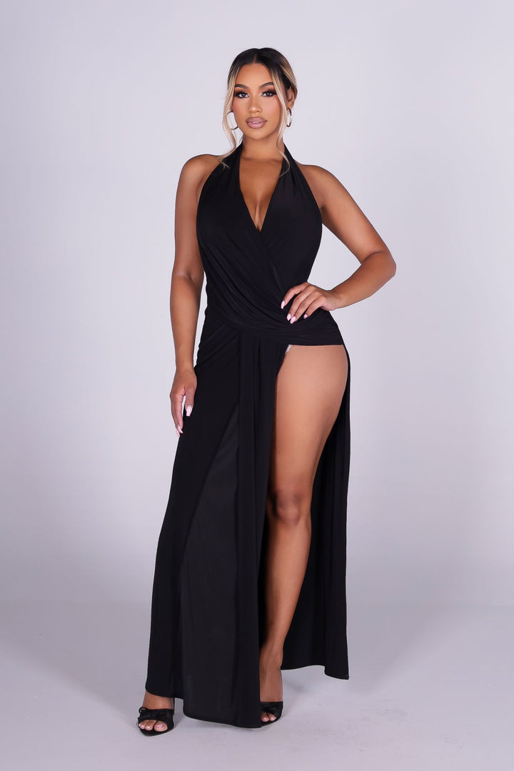 Plunging V cowl neck halter maxi dress with surplice wrap drape across the chest
Open back design with high side slit