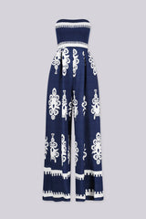 Wide leg strapless jumpsuit featuring high contrast retro print
Elasticized smocked tube top with pull on styling